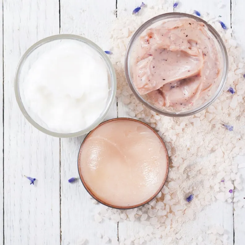Bowls of cream and clay textures with sea salt